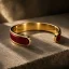 Niame Carmine Gold